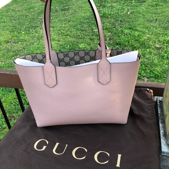 Gucci Handbags - Mini Gucci Reversible Tote.